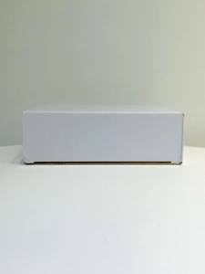 Front view of a minimalist white cardboard mailing box and gift packaging for handbag