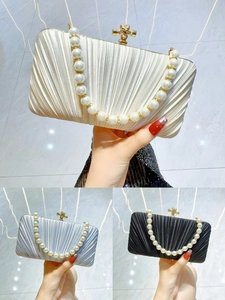 Elegant pleated satin evening clutch bag with pearl handle in champagne and silver
