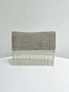 Silver evening clutch bag featuring shimmering rhinestones and long tassel fringe details