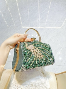 Luxury peacock evening clutch bag with green rhinestones and golden circular handle