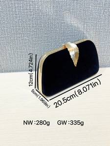 Elegant black velvet clutch bag with golden leaf clasp and metal frame for women