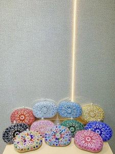 Elegant collection of rhinestone evening clutch bags with colorful mandala crystal patterns