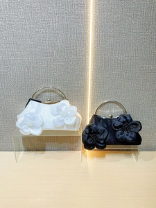 Elegant satin evening clutch bag with 3D floral petals and metal ring handle