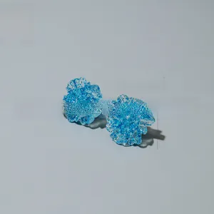Detail view of 2.5cm blue glitter flower stud earrings weighing 6.1g with size info
