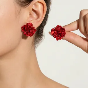 Fashionable blue 3D flower stud earrings for women with elegant textured petals design