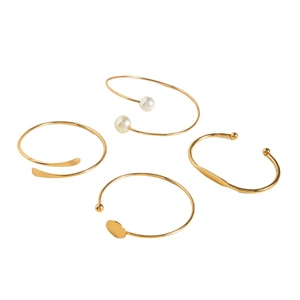 Chic 4-piece set of gold plated stacking bangles with faux pearls and circular charms