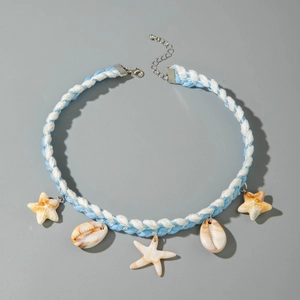 Detail of woven ocean-style necklace with starfish charms and shell pendants