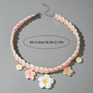 Detail of woven flower necklace with dimensions 42 plus 5.5cm shown on grey background