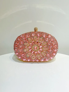 Detail of pink and champagne crystal floral pattern on luxury evening clutch bag