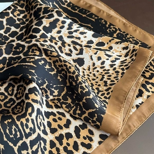 Elegant leopard print silk scarf with solid brown borders for beach and sun protection