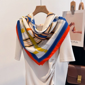 Silk-feel square scarf with equestrian print and orange border on white dress