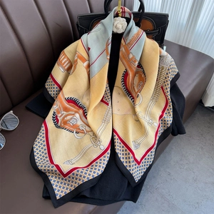Elegant mustard yellow silk-feel scarf with vintage horse harness print and blue polka dots