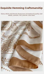 Close-up of premium silk scarf showing neat hem stitching and paisley floral patterns