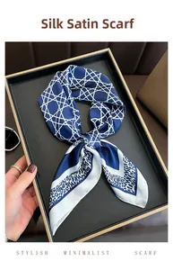 Detail of satin square scarf with navy blue geometric lines and leopard print edges