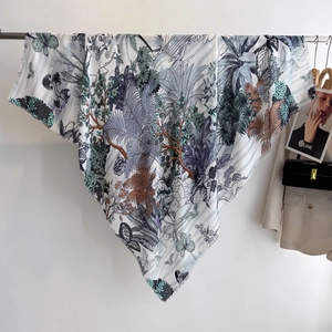 Elegant tropical jungle print scarf featuring palm leaves and butterflies for women