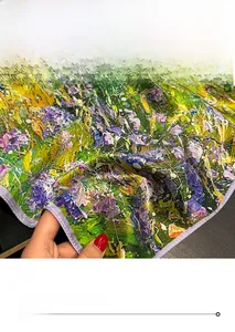 Macro shot of fine hemmed edges and oil painting print on 100% mulberry silk scarf