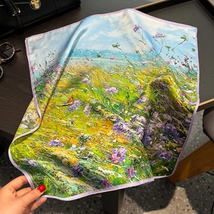 Elegant 100% mulberry silk scarf featuring floral oil painting design on wooden desk