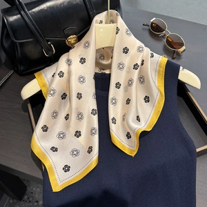 Silk feel champagne scarf with yellow borders and black camellia floral pattern