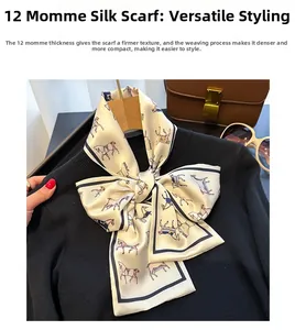 Detail of printed silk scarf tied in a bow on a sweater with horse patterns