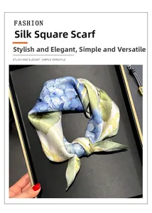 Detailed close-up of blue hydrangea silk scarf displayed in a premium gift box