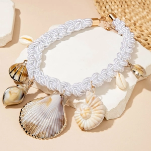 Bohemian woven shell necklace with assorted seashells and starfish for beach vacation