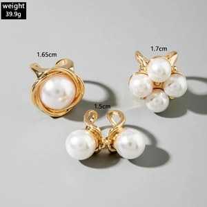 Detailed view of baroque pearl earring set with gold alloy frames and size markings