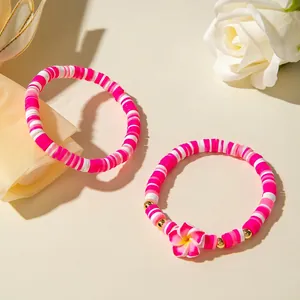 Set de bracelets bohèmes en perles d'argile avec pendentif fleur et perles dorées