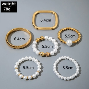 6-piece gold geometric bangle set with beads and pearls, weighing 78g in detail view