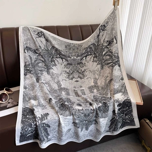 Floral square scarf with black and white tropical print featuring leopard and palm trees