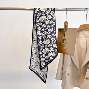 Floral geometric silk scarf for women featuring camellia pattern and dark blue border