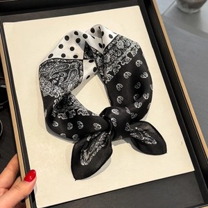 Polka dot and paisley print mulberry silk neckerchief with a decorative ring knot