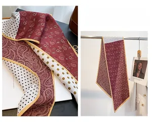 Detail of silk scarf featuring burgundy paisley and black white polka dot patchwork