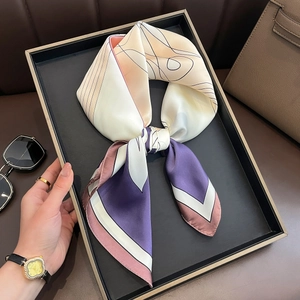 French style abstract geometric silk scarf for women displayed with fashion accessories