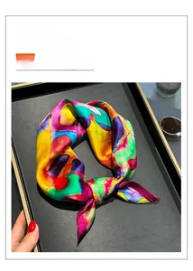 Detail of colorful oil painting print on 100% mulberry silk square scarf in frame
