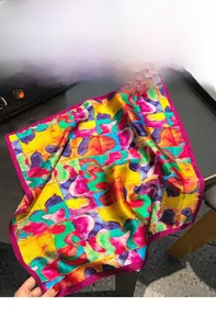 Detail of colorful oil painting print 100% mulberry silk square scarf with vibrant hand-rolled edges