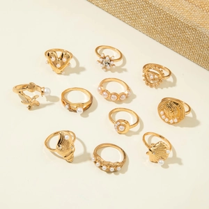 Bohemian gold ring set with 11 pieces featuring pearls, starfish and moon designs
