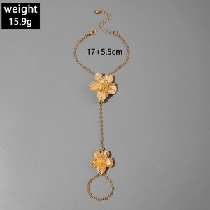 Detail of gold flower hand chain with ring showing 17cm length and 15.9g weight info