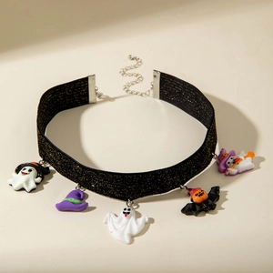 Detail of glitter black choker with Halloween ghost, witch hat and bat charms