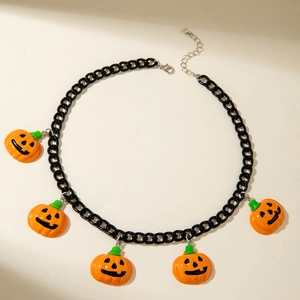 Close-up of Halloween necklace featuring five orange pumpkin pendants and black chain