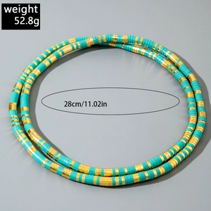 Detail of bohemian turquoise and gold beaded layered necklace with 52.8g weight