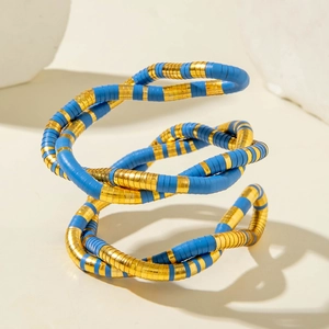 Modern spiral snake-shaped necklace with blue and gold textured metallic beads