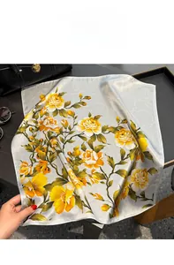 Macro detail of luxury silk scarf with vintage floral patterns and glossy satin texture