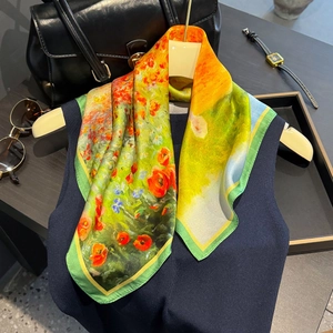Silk square scarf with red poppy floral print on a vibrant yellow and green background