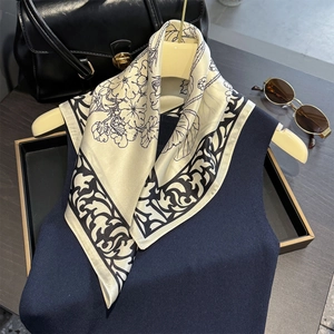 Elegant off-white silk scarf with black vintage butterfly floral print on hanger