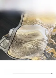 Close-up of fine hemmed edges and traditional ink painting print on silk square scarf