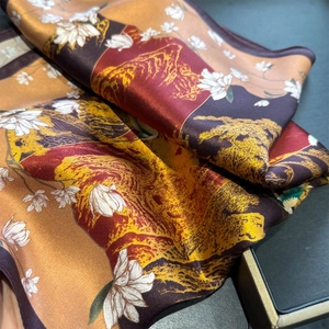 Elegant silk scarf with magnolia and landscape print in bronze and burgundy tones