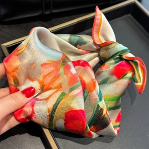 Elegant 100% mulberry silk square scarf with vibrant floral print and silky luster