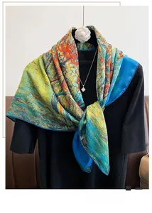 Detail showing the artistic oil painting pattern and smooth silk texture of the scarf
