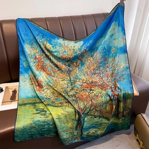 Artistic Van Gogh oil painting style silk scarf displayed on a luxury leather sofa
