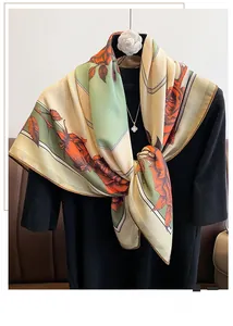 Detail of vintage floral printed scarf with elegant hemwork and botanical patterns